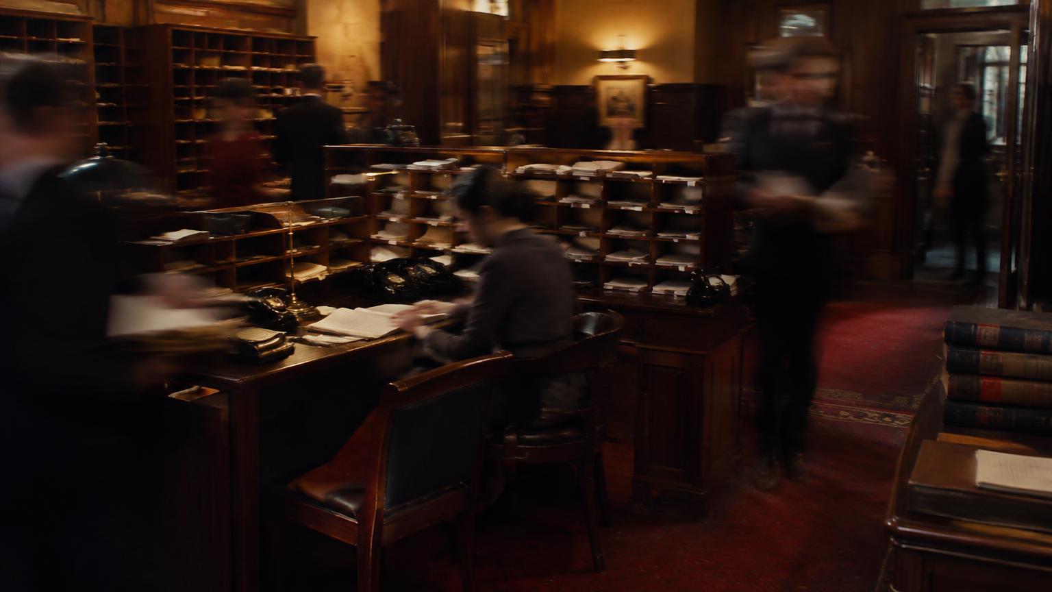 Busy chambers clerks room with pigeonholes, diaries and telephones
